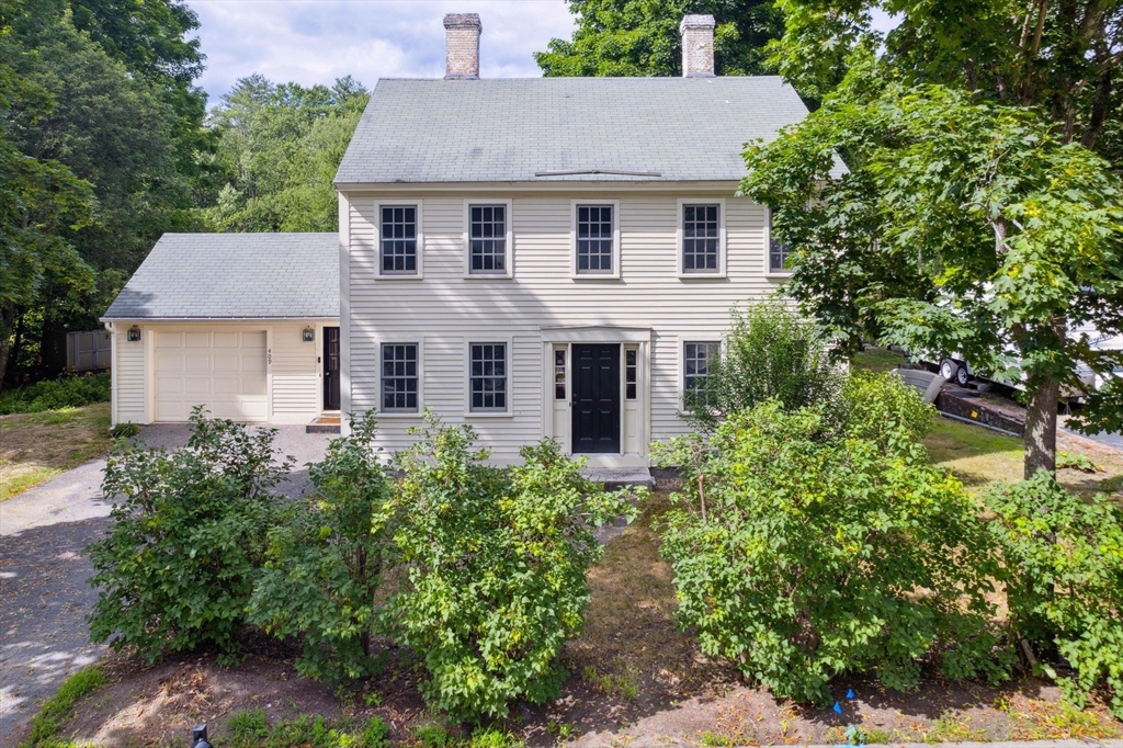 409 Main Street Townsend, MA 01474 - Photo 1 of 35 front view of a house with a yard