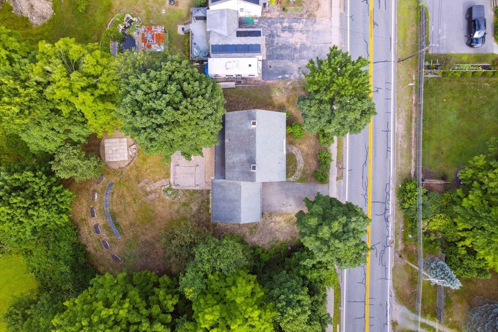 409 Main Street Townsend, MA 01474 - Photo 29 of 35 an aerial view of a house with a yard and large tree