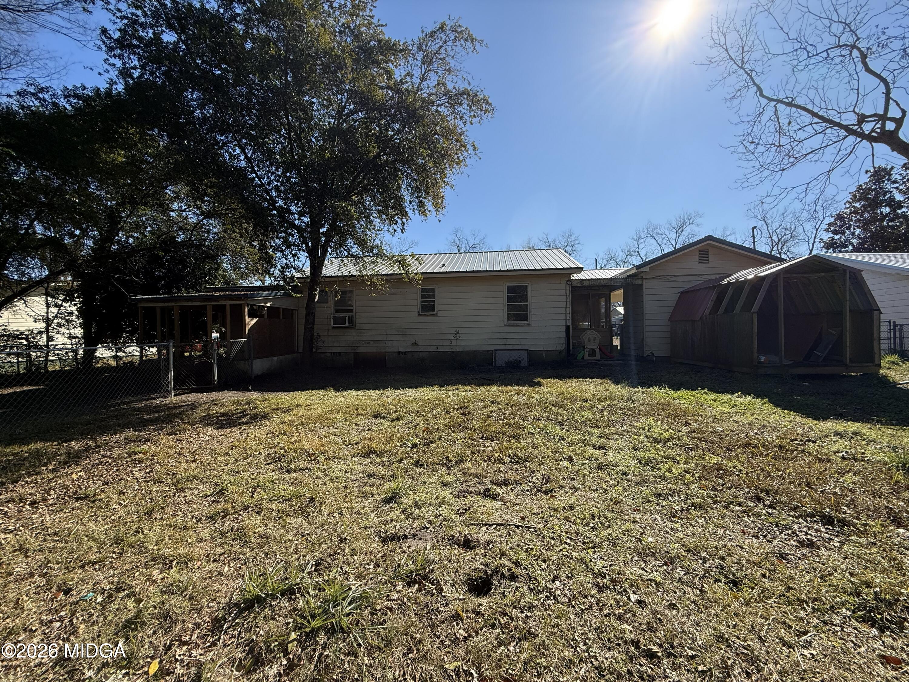 145 Edmondson Circle Cochran, GA 31014 - Photo 13 of 13 a house view with a garden space