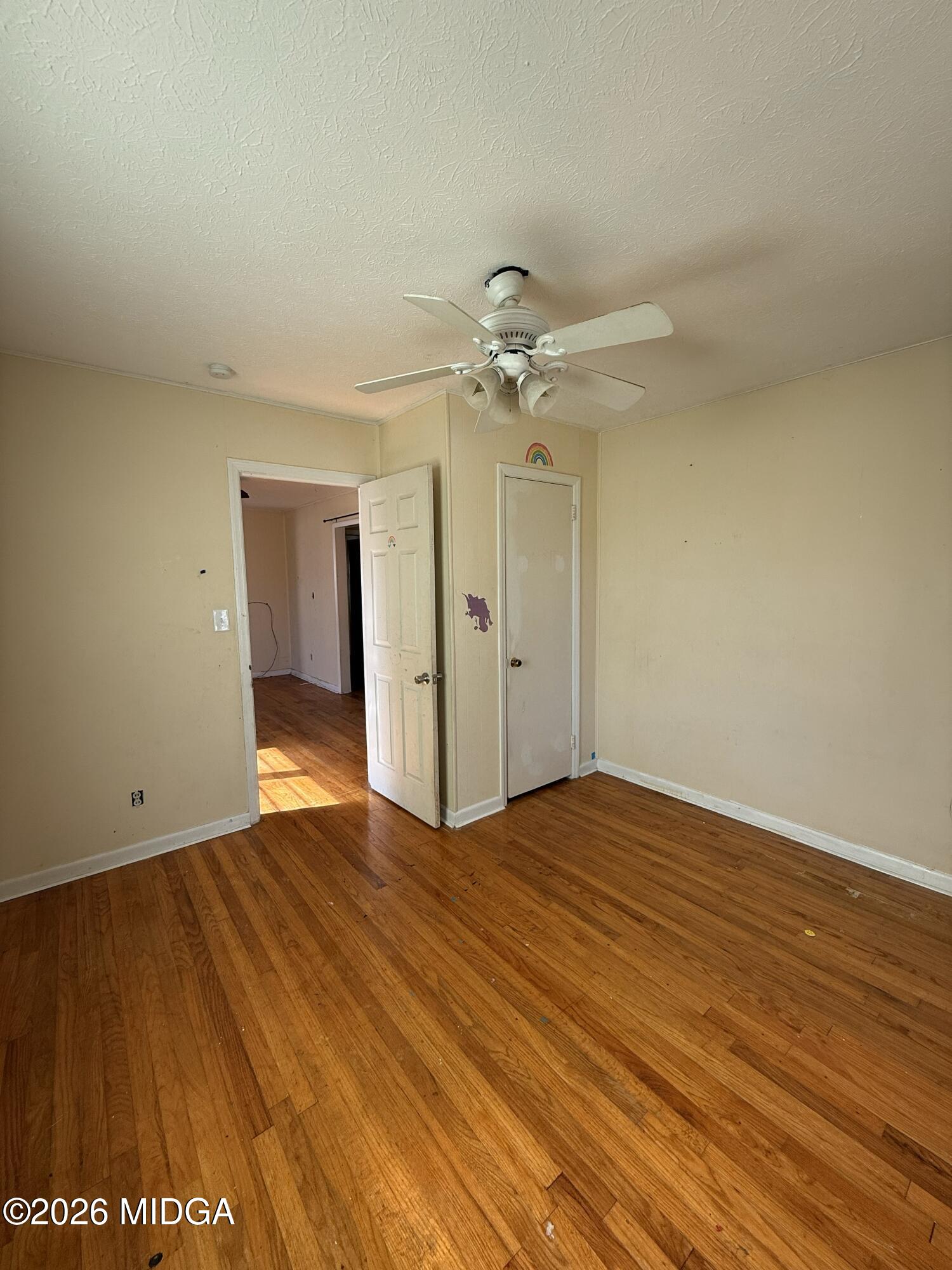 145 Edmondson Circle Cochran, GA 31014 - Photo 5 of 13 wooden floor in an empty room