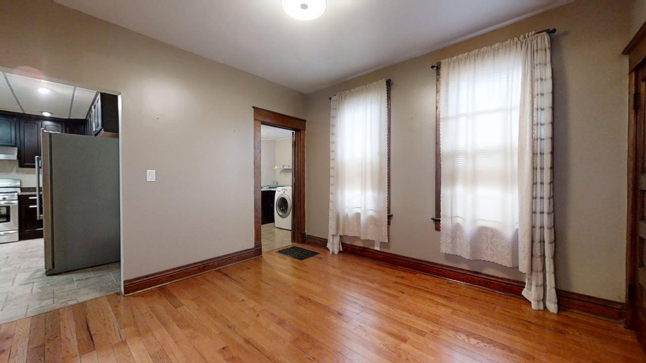 118 North Hartwell Street Gilman, IL 60938 - Photo 18 of 56 a view of empty room with wooden floor