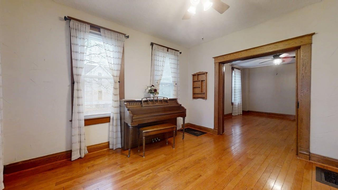 118 North Hartwell Street Gilman, IL 60938 - Photo 5 of 56 a view of a livingroom with furniture and wooden floor