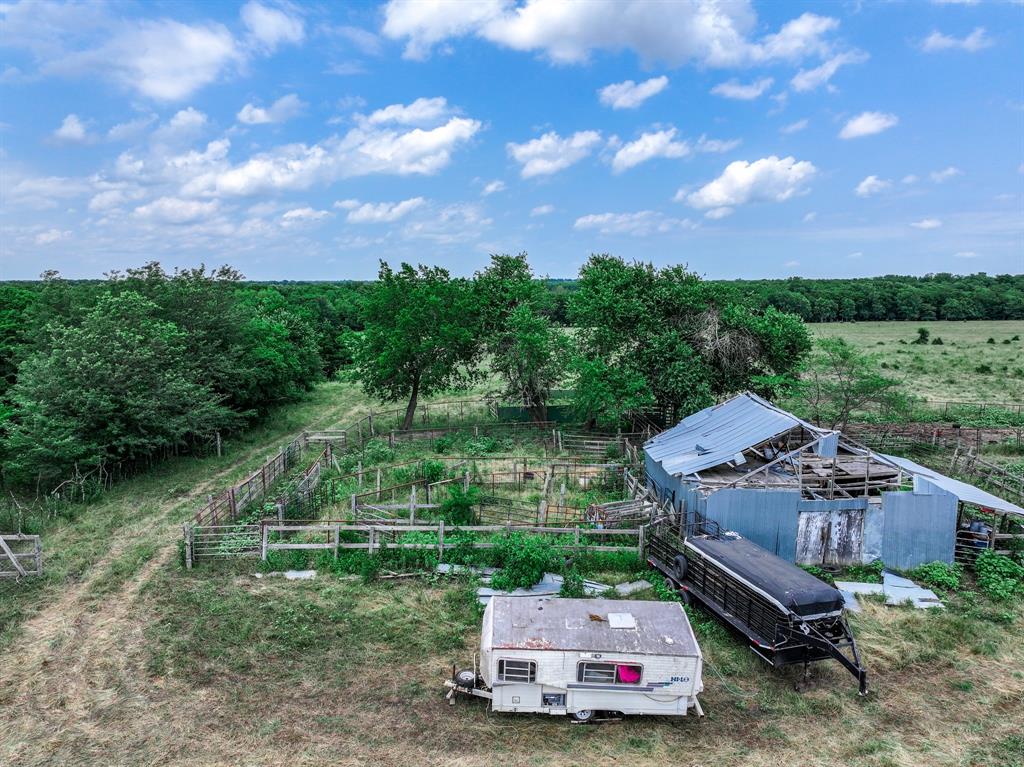 2190 County Road 2190 Commerce, TX 75428 - Photo 25 of 35 a garden view with a seating space