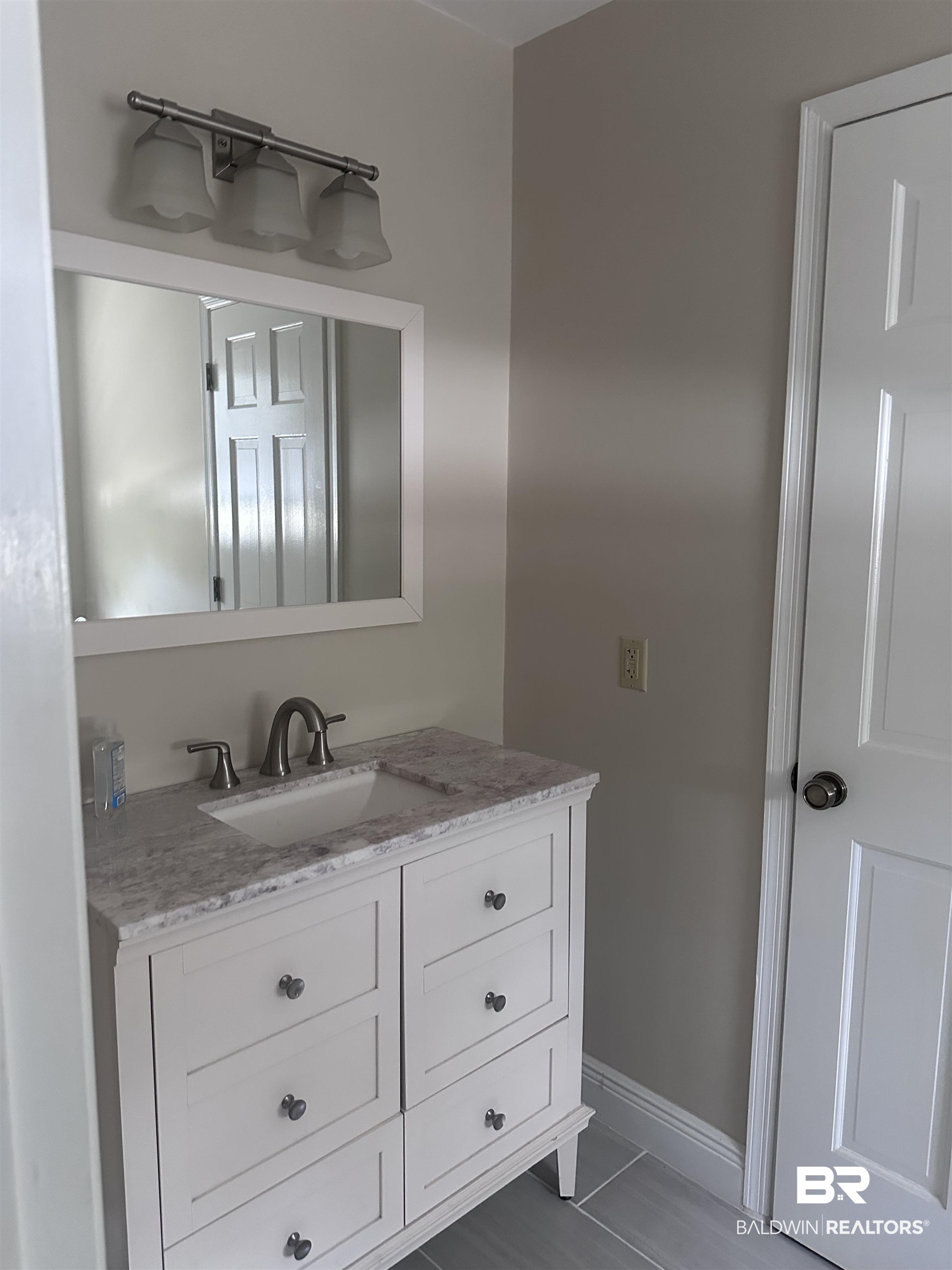 2785 Sowell Road Brewton, AL 36426 - Photo 7 of 24 Bathroom with vanity and baseboards