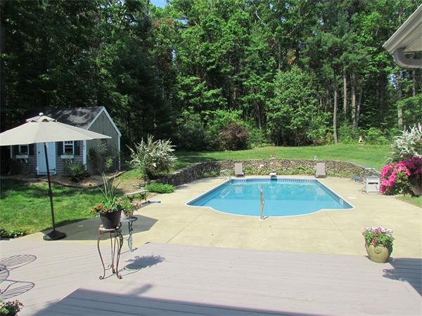 26 Nashaway Road Bolton, MA 01740 - Photo 14 of 15 a view of a swimming pool with a patio