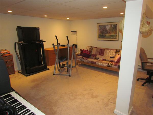 26 Nashaway Road Bolton, MA 01740 - Photo 9 of 15 a living room with furniture and a flat screen tv