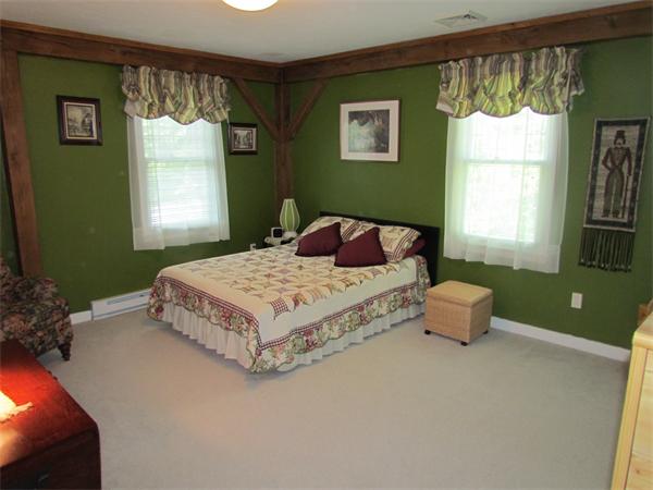 26 Nashaway Road Bolton, MA 01740 - Photo 10 of 15 a bedroom with a bed and window