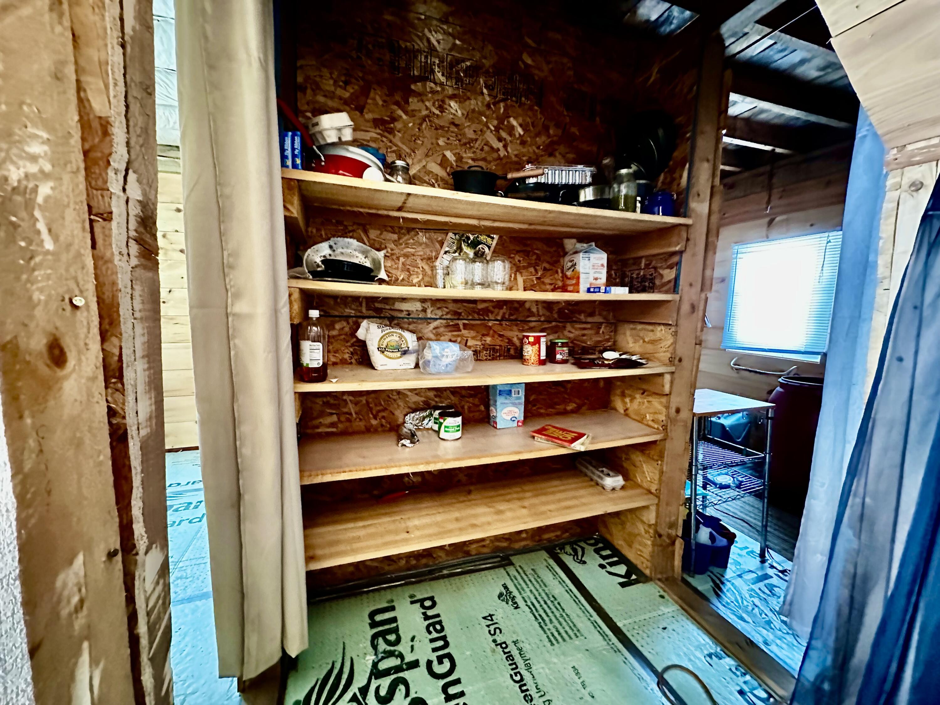 608 Deer Haven Road Wesley, ME 04686 - Photo 11 of 37 Pantry between bedroom and bathroom