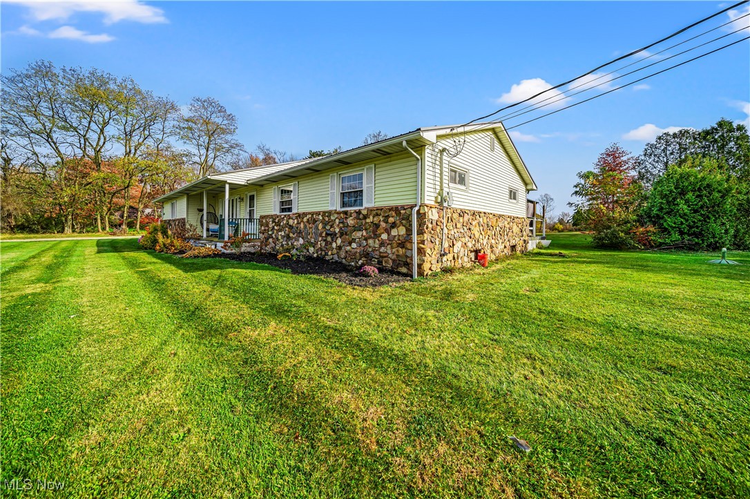 4188 State Road South Ashtabula, OH 44004 - Photo 3 of 46 View of home's exterior with a lawn