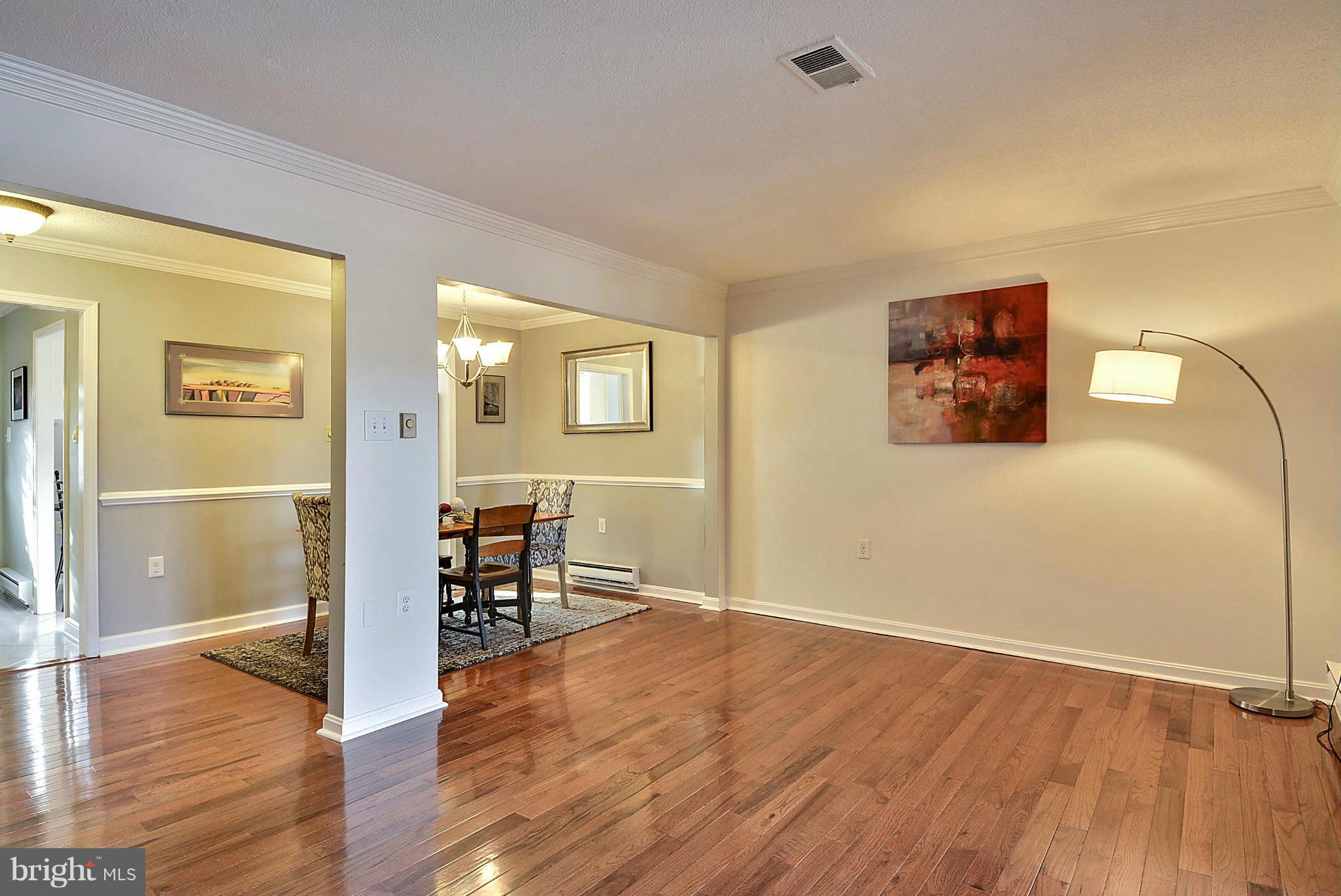 322 Rock Spring Drive Southwest Leesburg, VA 20175 - Photo 11 of 28 Living Room with brand new gleaming hard woods