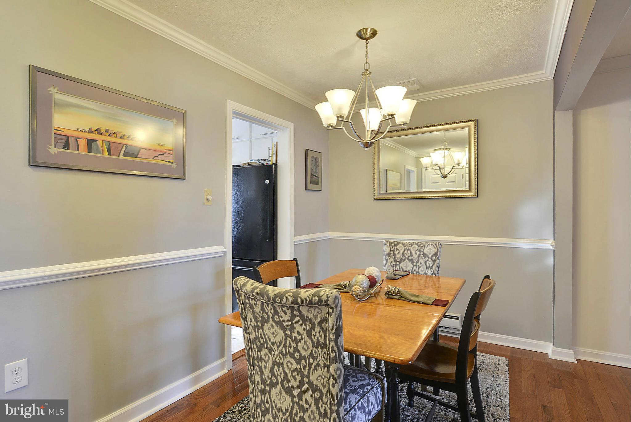 322 Rock Spring Drive Southwest Leesburg, VA 20175 - Photo 8 of 28 Dining Room featuring custom moldings