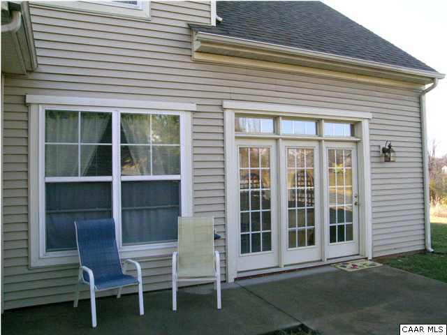 1310 Stoney Ridge Road Charlottesville, VA 22902 - Photo 7 of 22 a front view of a house with a window