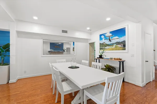a view of a dining room with furniture