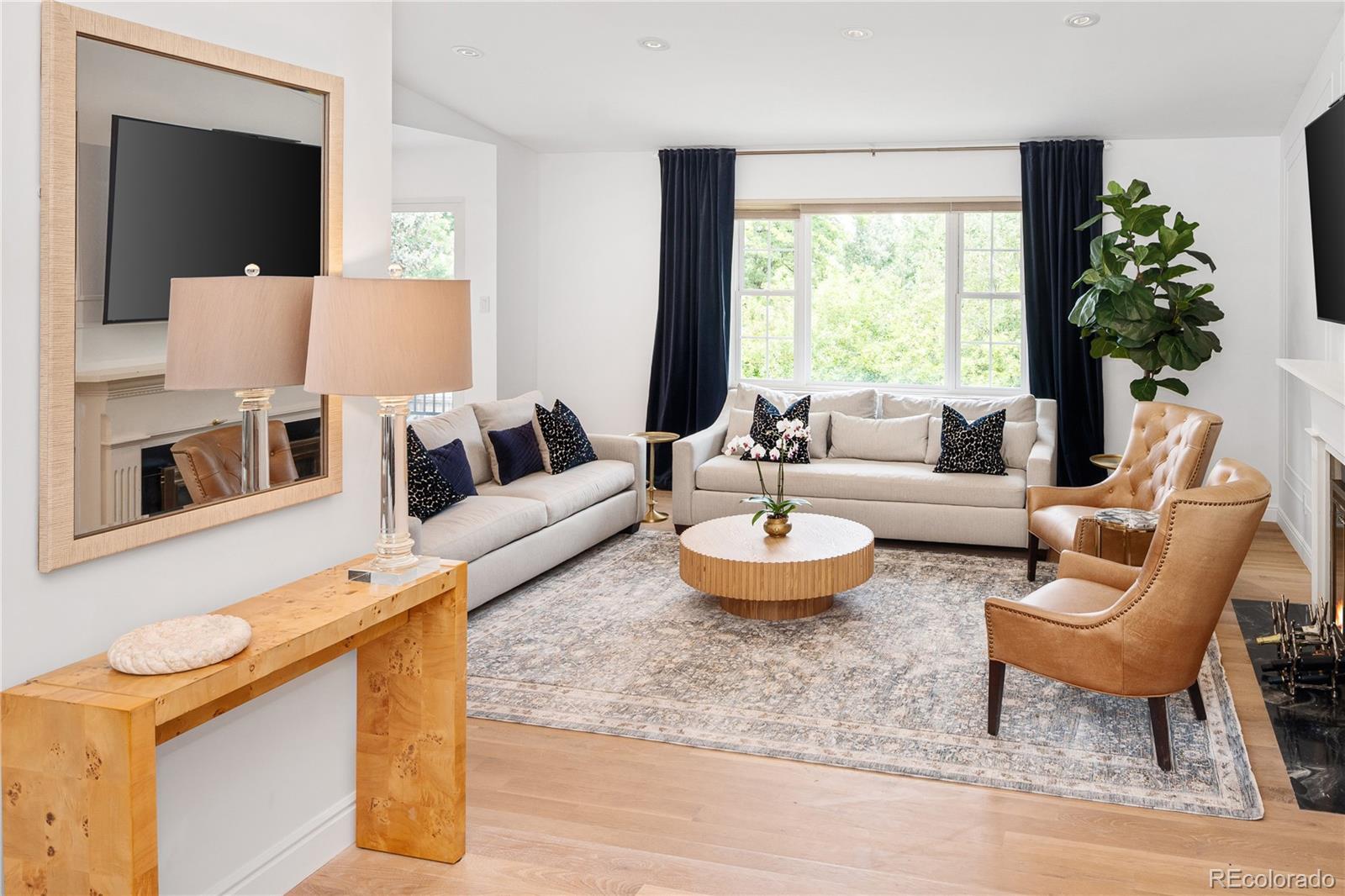 1 Hillside Drive Wheat Ridge, CO 80215 - Photo 3 of 50 a living room with furniture and a large window