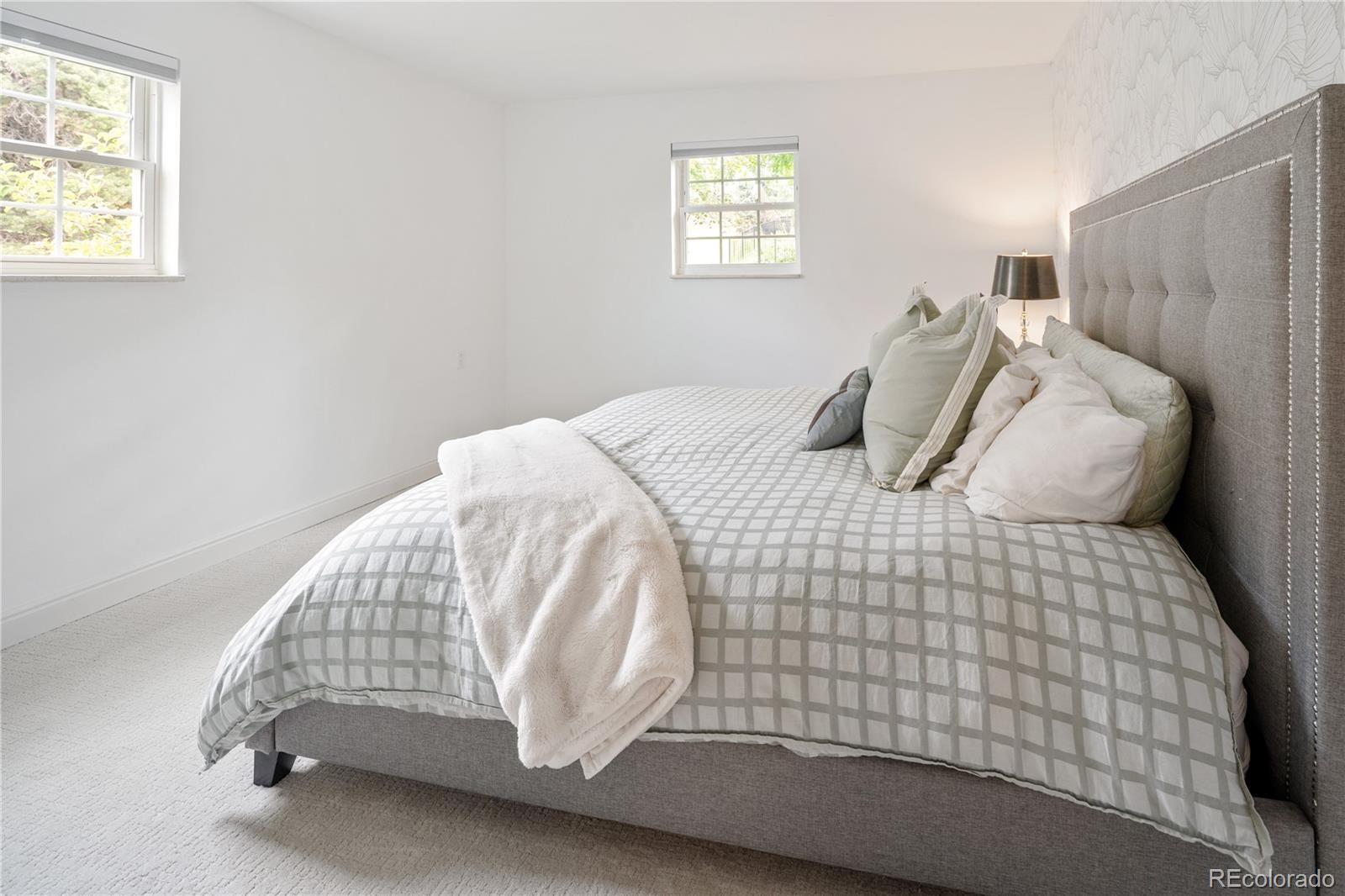 1 Hillside Drive Wheat Ridge, CO 80215 - Photo 40 of 50 a bedroom with a bed and a window