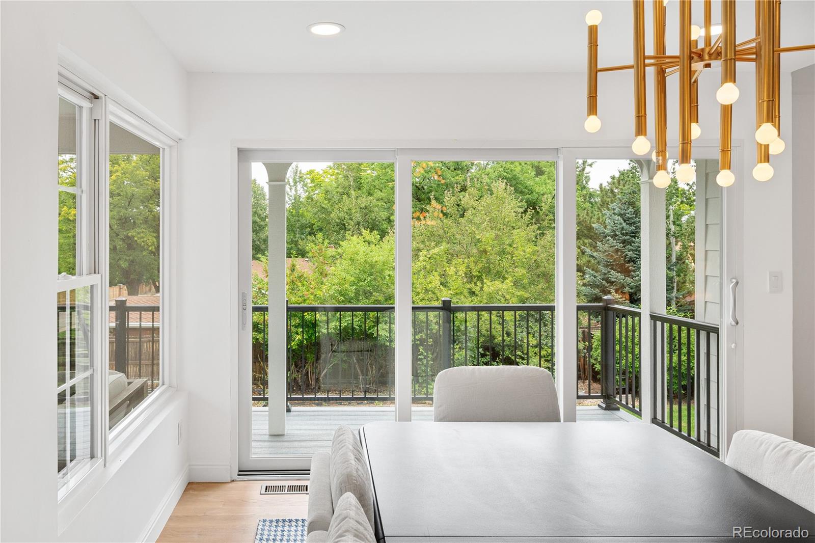 1 Hillside Drive Wheat Ridge, CO 80215 - Photo 5 of 50 a bedroom with furniture and a window