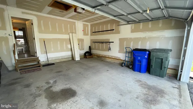 a view of an empty room with a fireplace