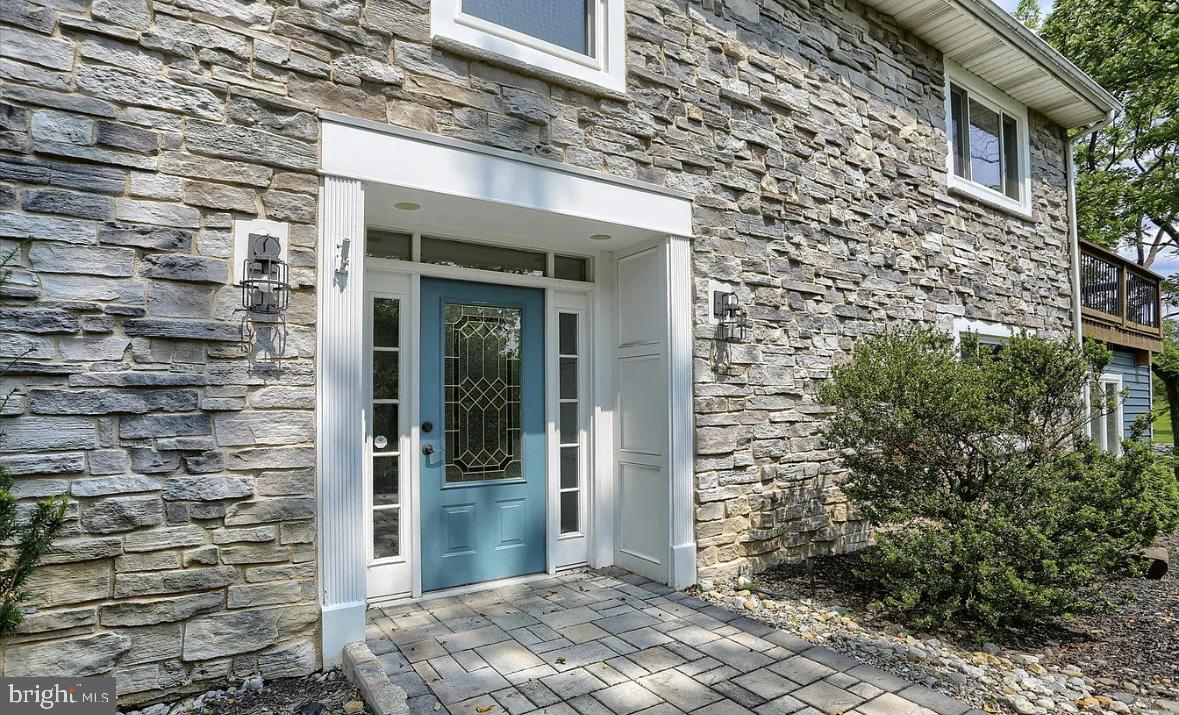 1801 Crums Mill Road Harrisburg, PA 17110 - Photo 2 of 29 front view of a brick house with a large window