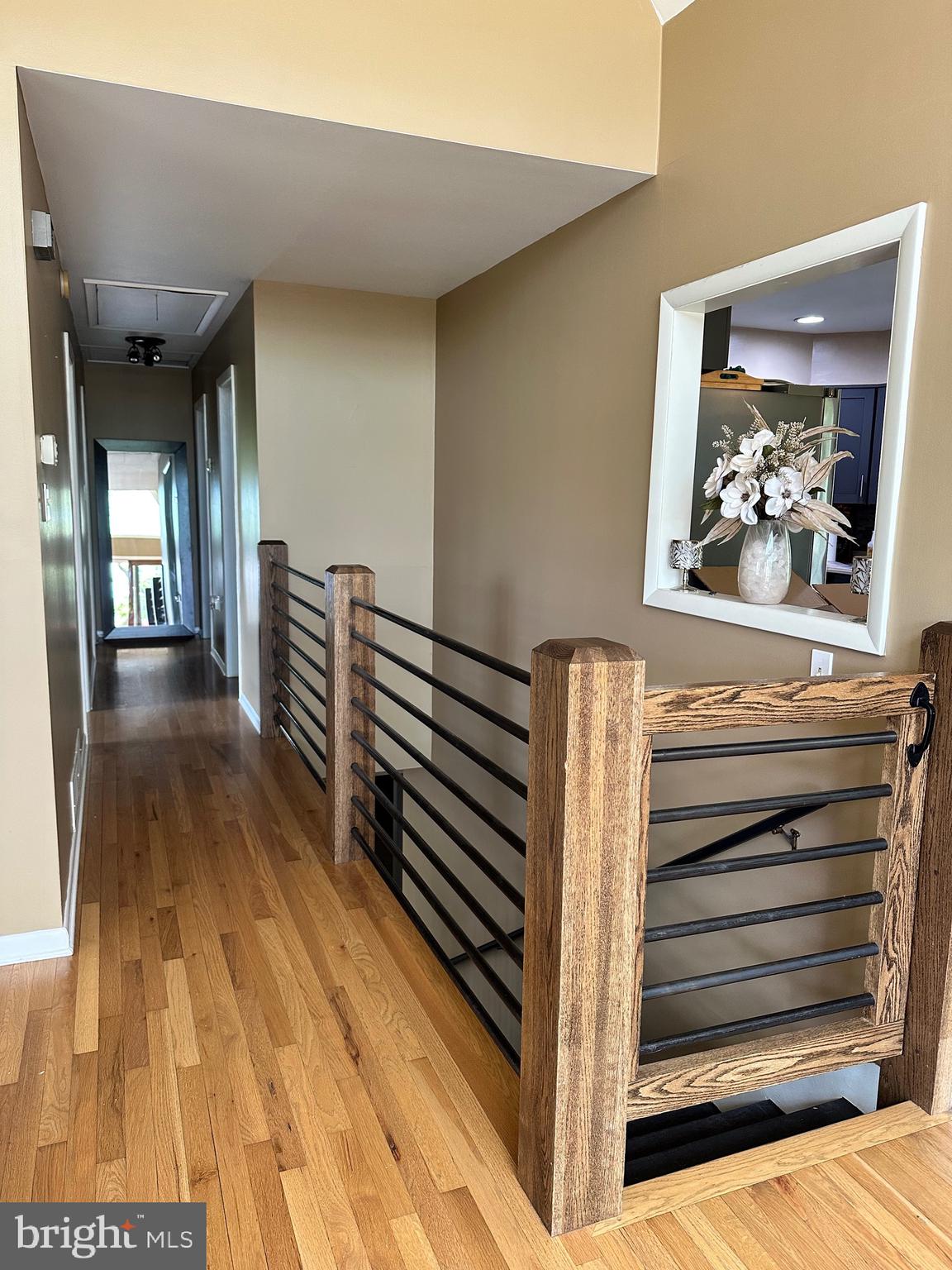 1801 Crums Mill Road Harrisburg, PA 17110 - Photo 10 of 29 a view of a hallway with wooden floor and staircase