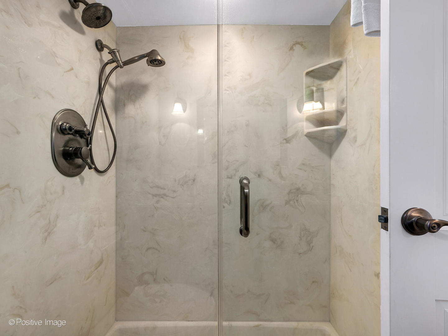 40 North Tower Road, Unit 12F Oak Brook, IL 60523 - Photo 15 of 25 a bathroom with a shower