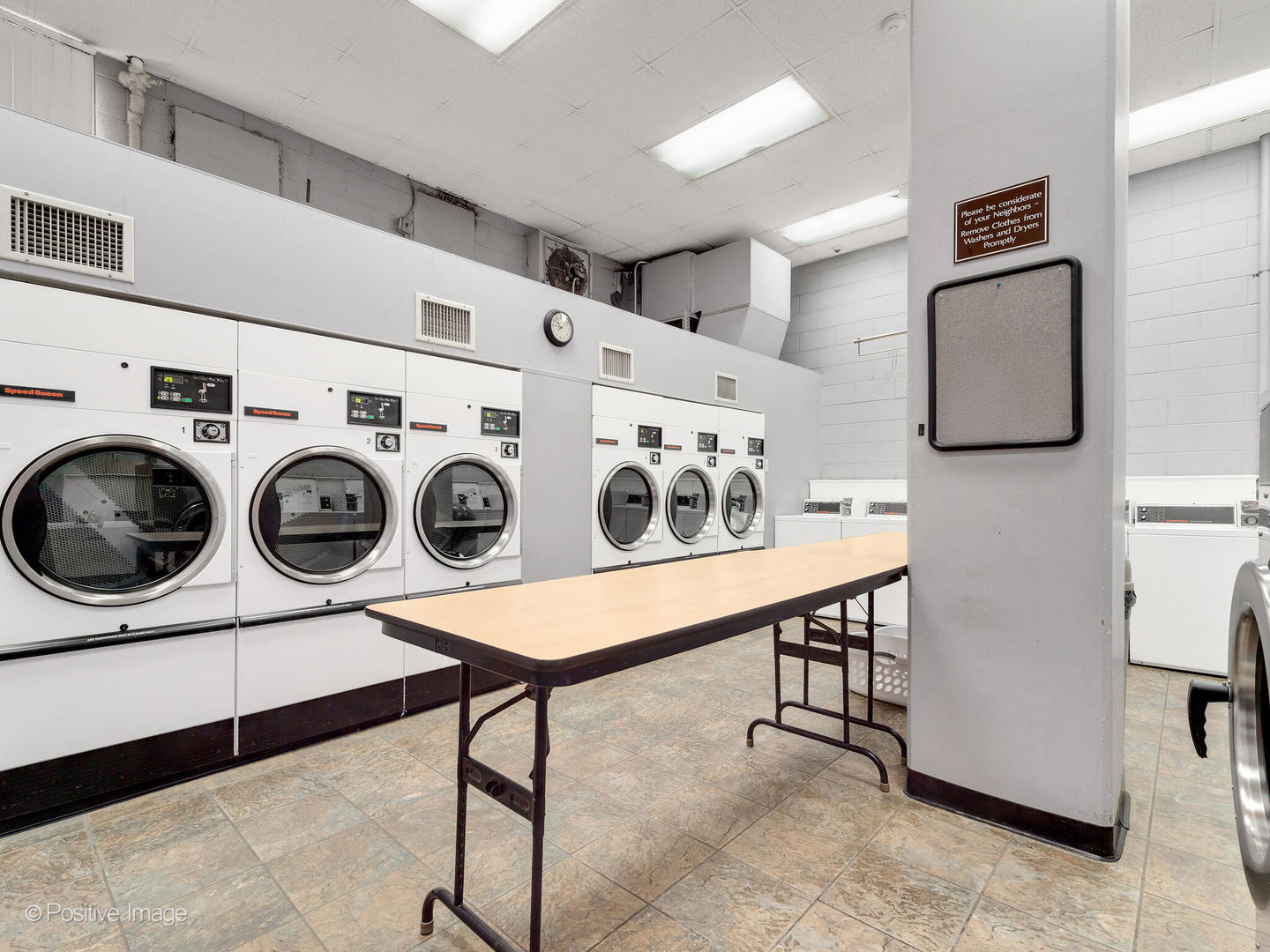 40 North Tower Road, Unit 12F Oak Brook, IL 60523 - Photo 22 of 25 a utility room with dryer and washer