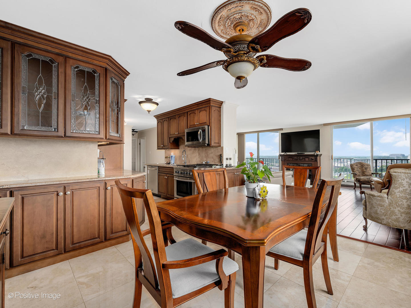 40 North Tower Road, Unit 12F Oak Brook, IL 60523 - Photo 7 of 25 a dining room with furniture and window