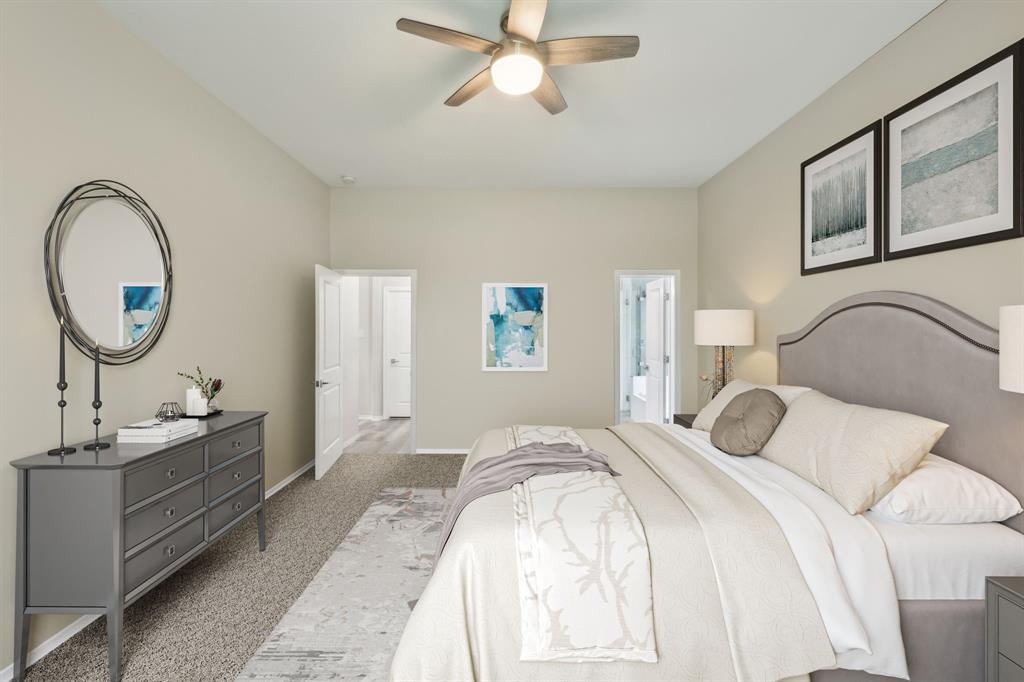 1122 Alicia Lane Lancaster, TX 75134 - Photo 11 of 37 a bedroom with bed and a chandelier