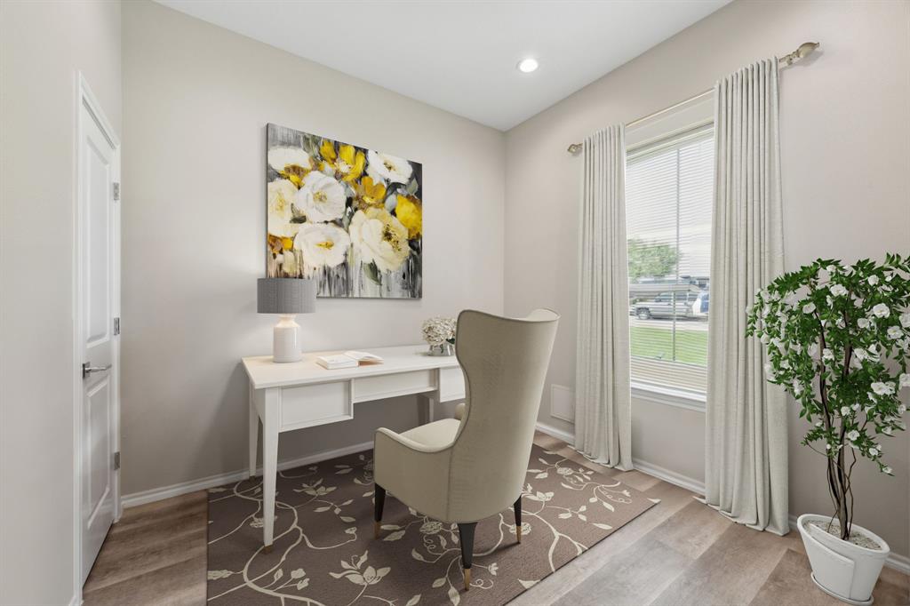 1122 Alicia Lane Lancaster, TX 75134 - Photo 14 of 37 a view of a dining room with furniture window and wooden floor