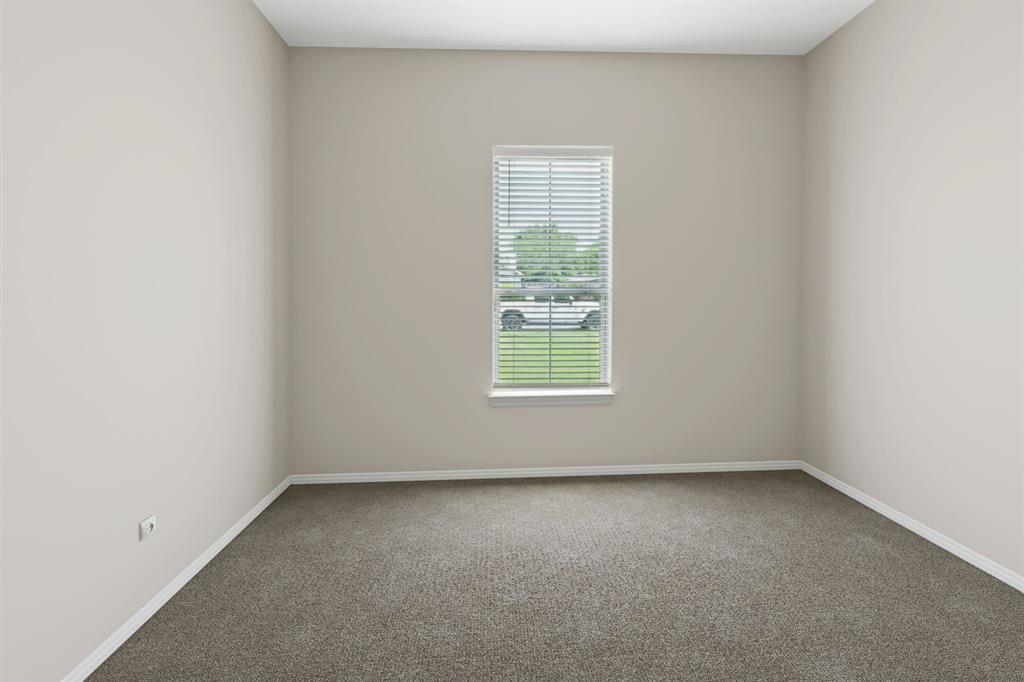 1122 Alicia Lane Lancaster, TX 75134 - Photo 15 of 37 an empty room with a window