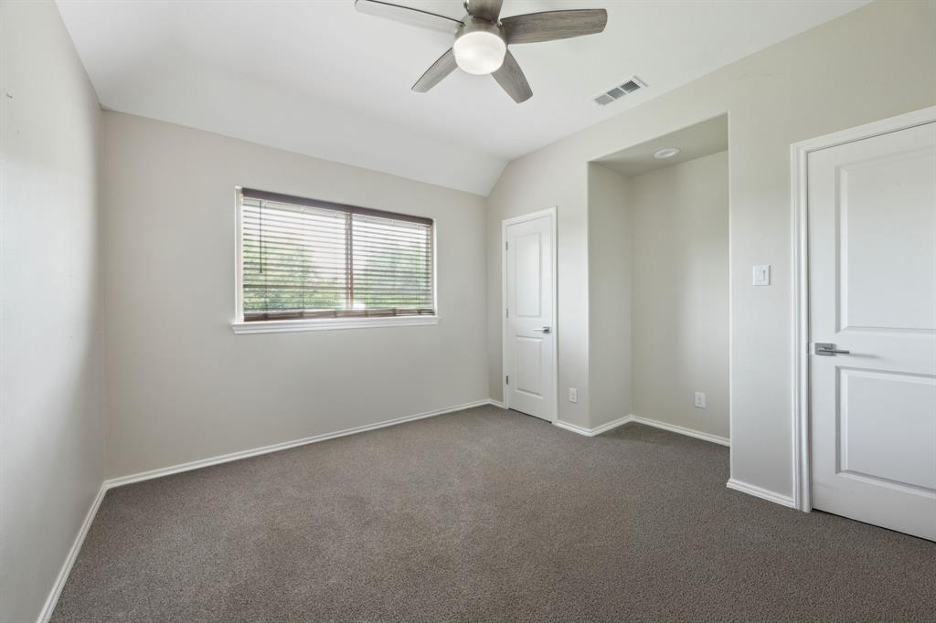 1122 Alicia Lane Lancaster, TX 75134 - Photo 17 of 37 a view of an empty room with a window