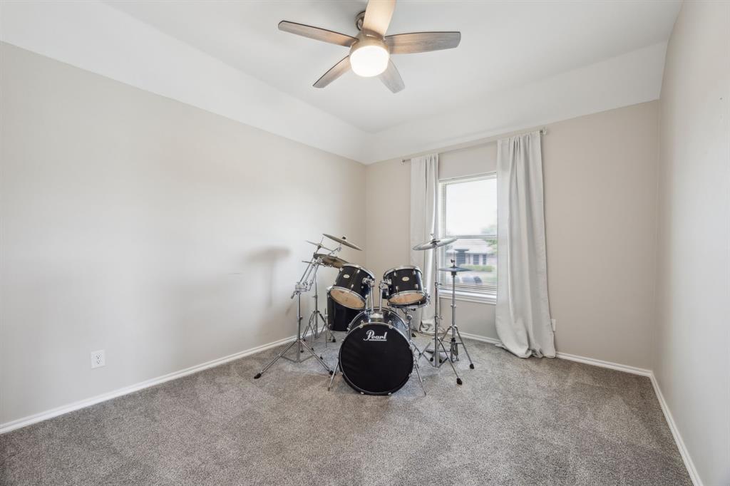 1122 Alicia Lane Lancaster, TX 75134 - Photo 21 of 37 a view of a room with gym equipment