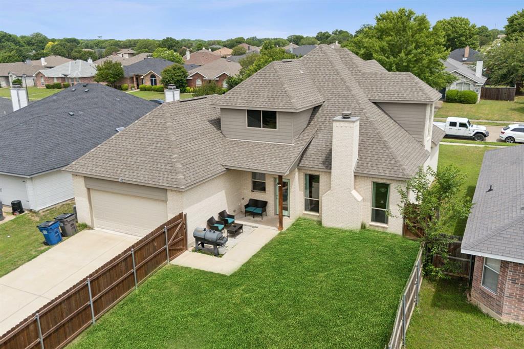 1122 Alicia Lane Lancaster, TX 75134 - Photo 29 of 37 an aerial view of a house with garden