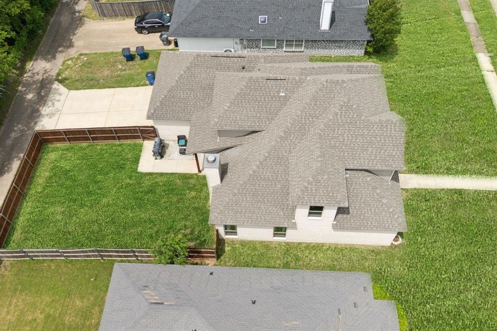 1122 Alicia Lane Lancaster, TX 75134 - Photo 32 of 37 an aerial view of residential house with outdoor space and trees all around