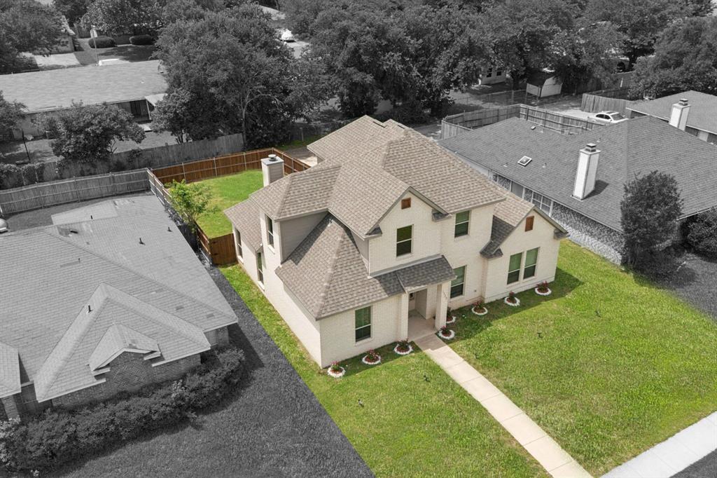 1122 Alicia Lane Lancaster, TX 75134 - Photo 35 of 37 an aerial view of a house with a yard