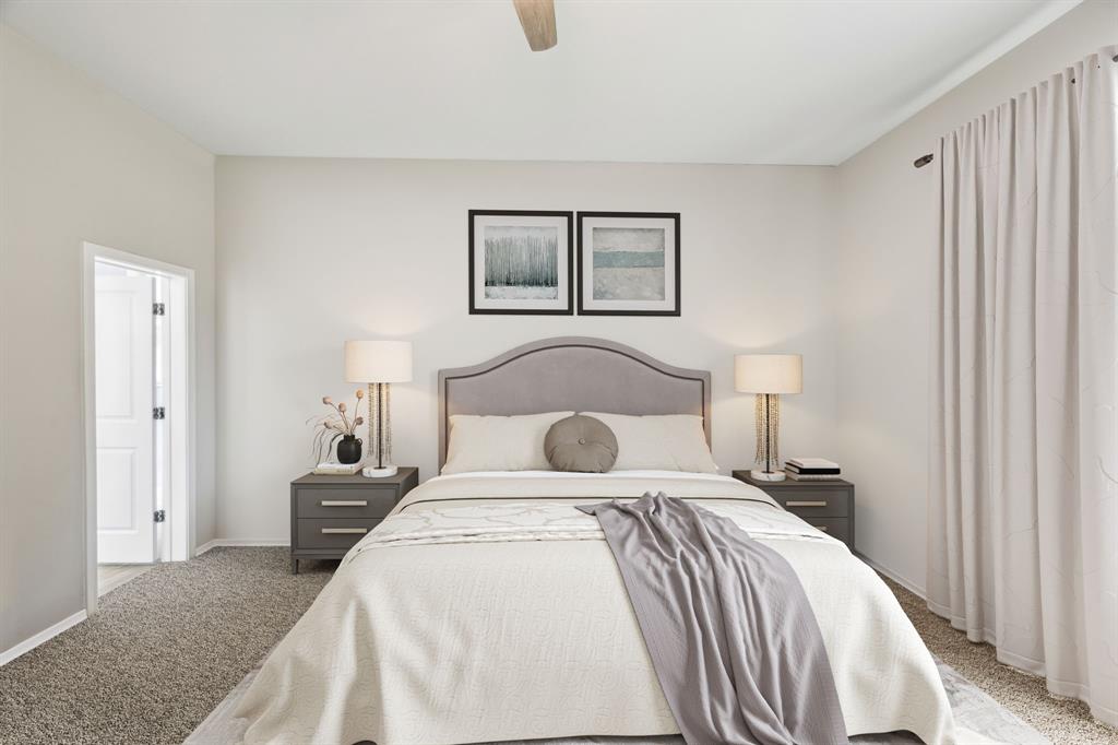 1122 Alicia Lane Lancaster, TX 75134 - Photo 10 of 37 a bedroom with a bed and painting on the wall