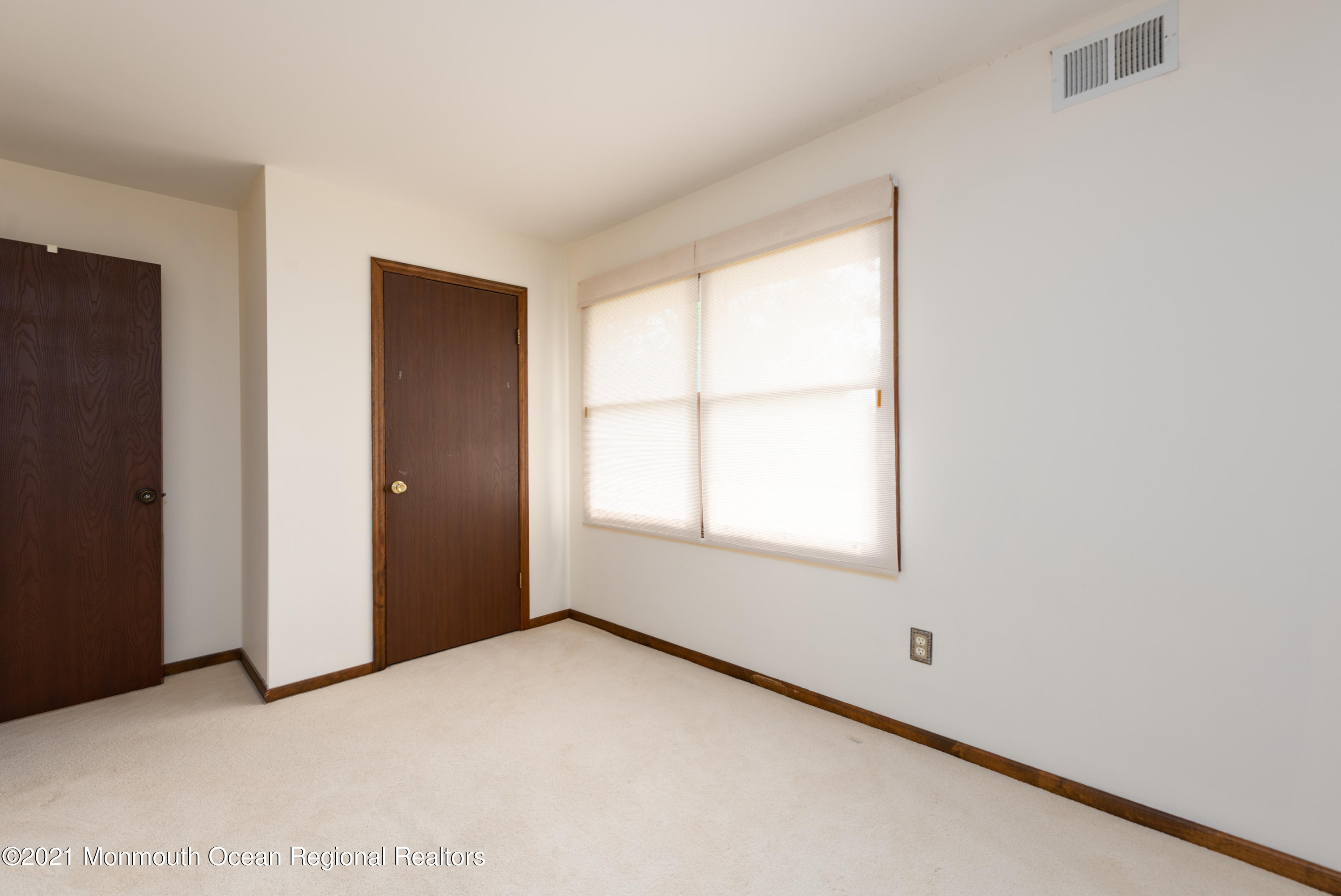 537 Line Road Aberdeen, NJ 07747 - Photo 19 of 23 a view of an empty room with a window