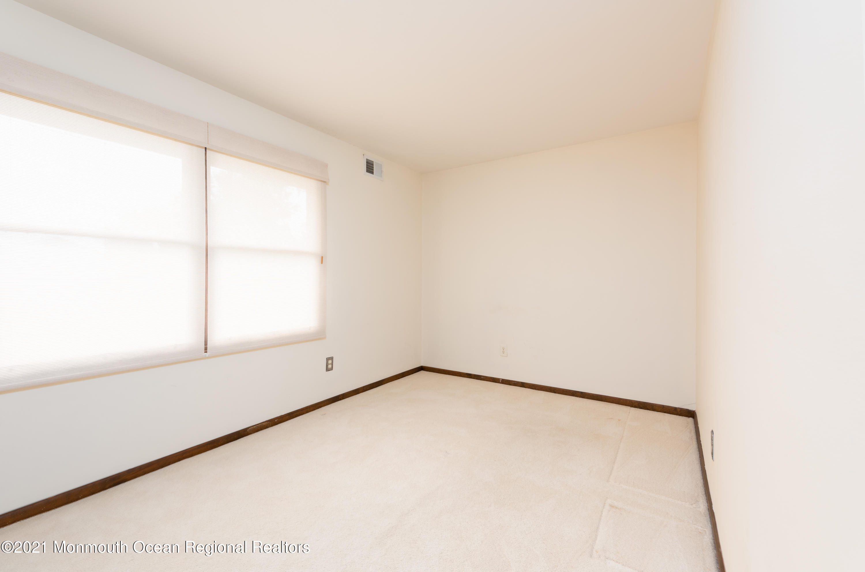 537 Line Road Aberdeen, NJ 07747 - Photo 22 of 23 a view of an empty room with a window
