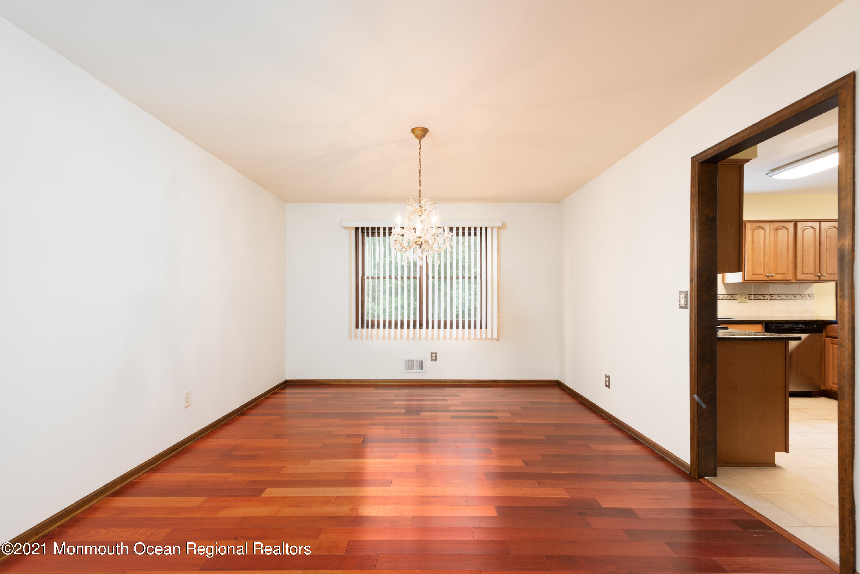 537 Line Road Aberdeen, NJ 07747 - Photo 7 of 23 a view of an empty room with a window