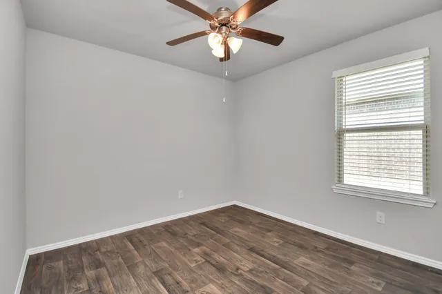 a black and white photo of a living room