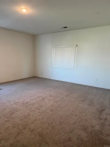 an empty room with a natural light