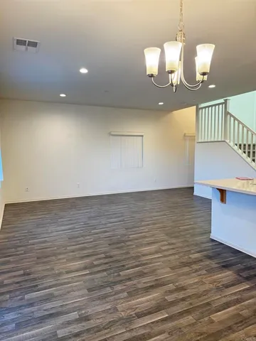 a view of a livingroom with an empty space