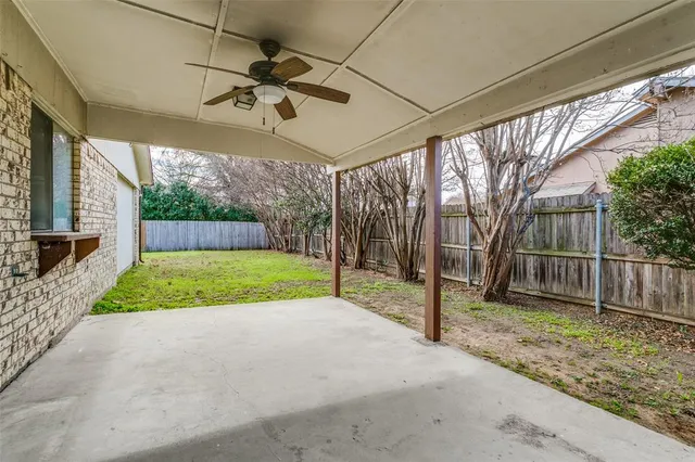 a view of swimming pool with a backyard