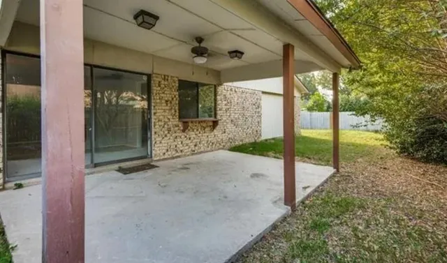 a view of a porch with a garden