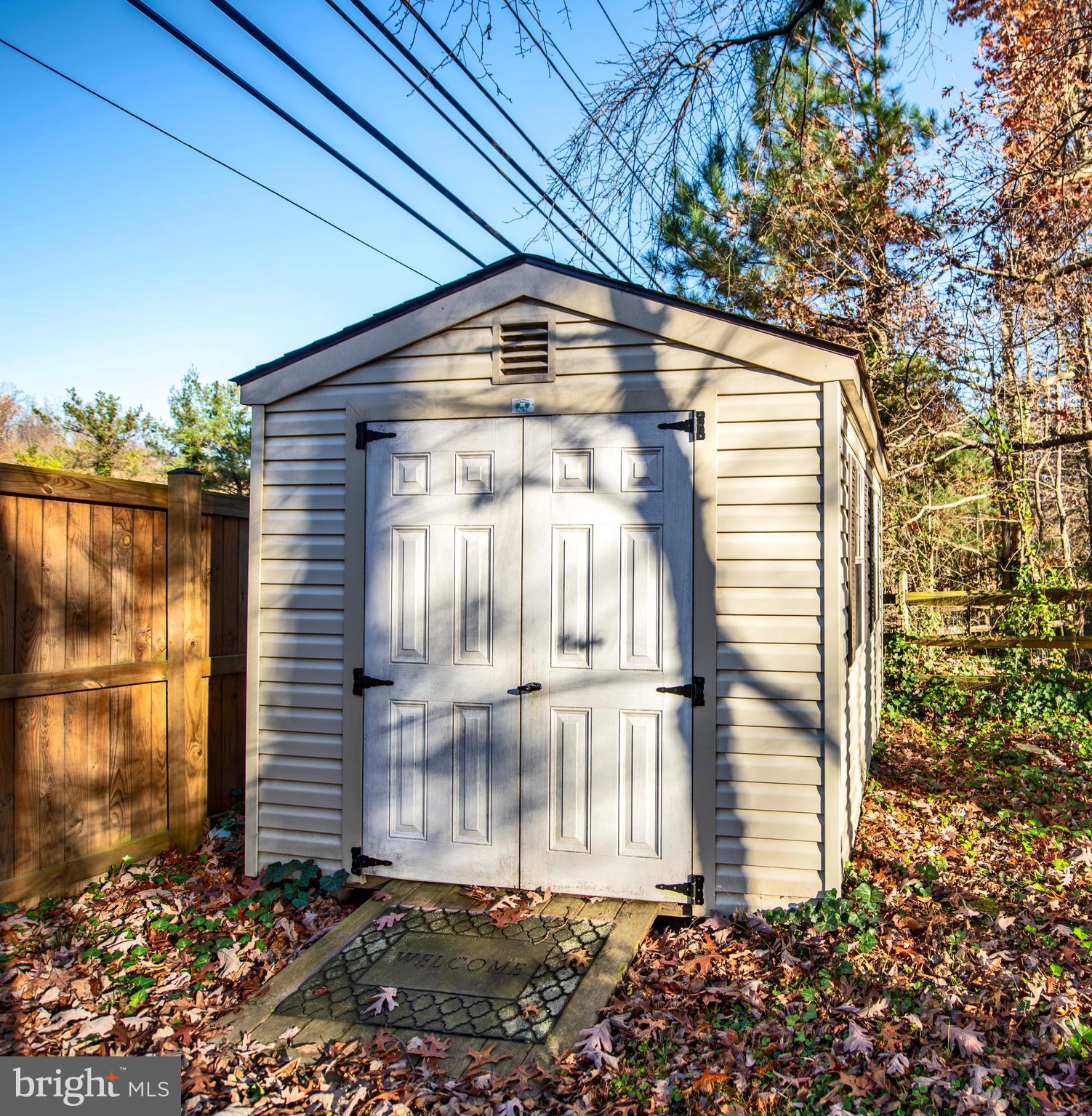 4542 Ambermill Road Nottingham, MD 21236 - Photo 34 of 37 Young fence and shed