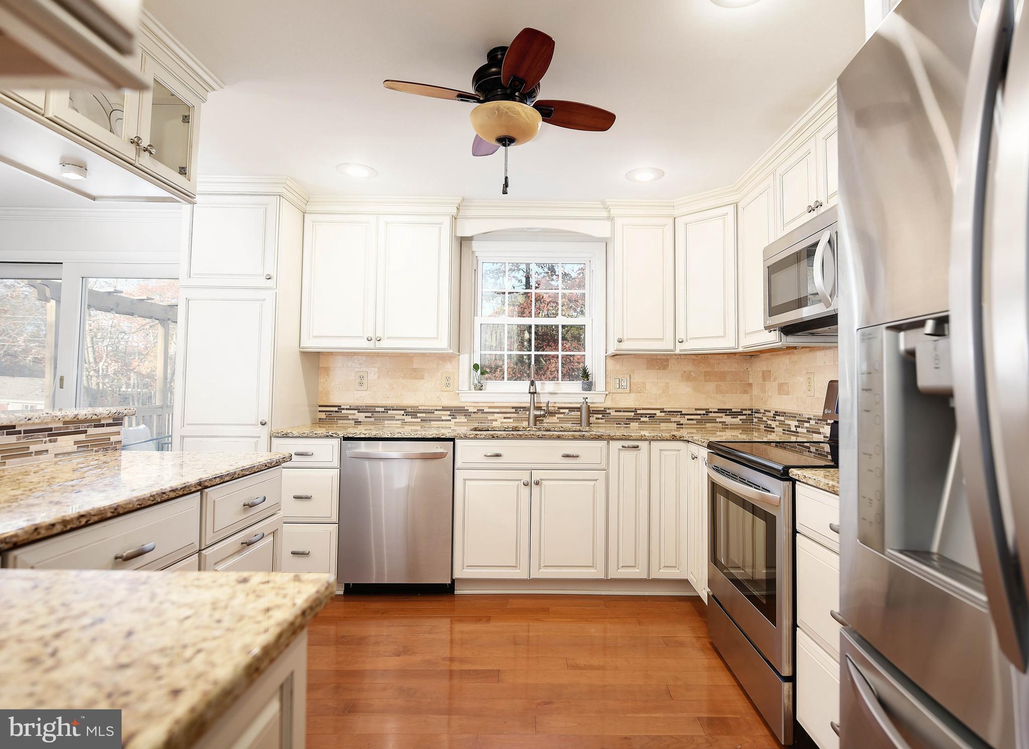 4542 Ambermill Road Nottingham, MD 21236 - Photo 7 of 37 Granite Counters with hardwood flooring