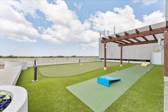 a view of a swimming pool with a lake view