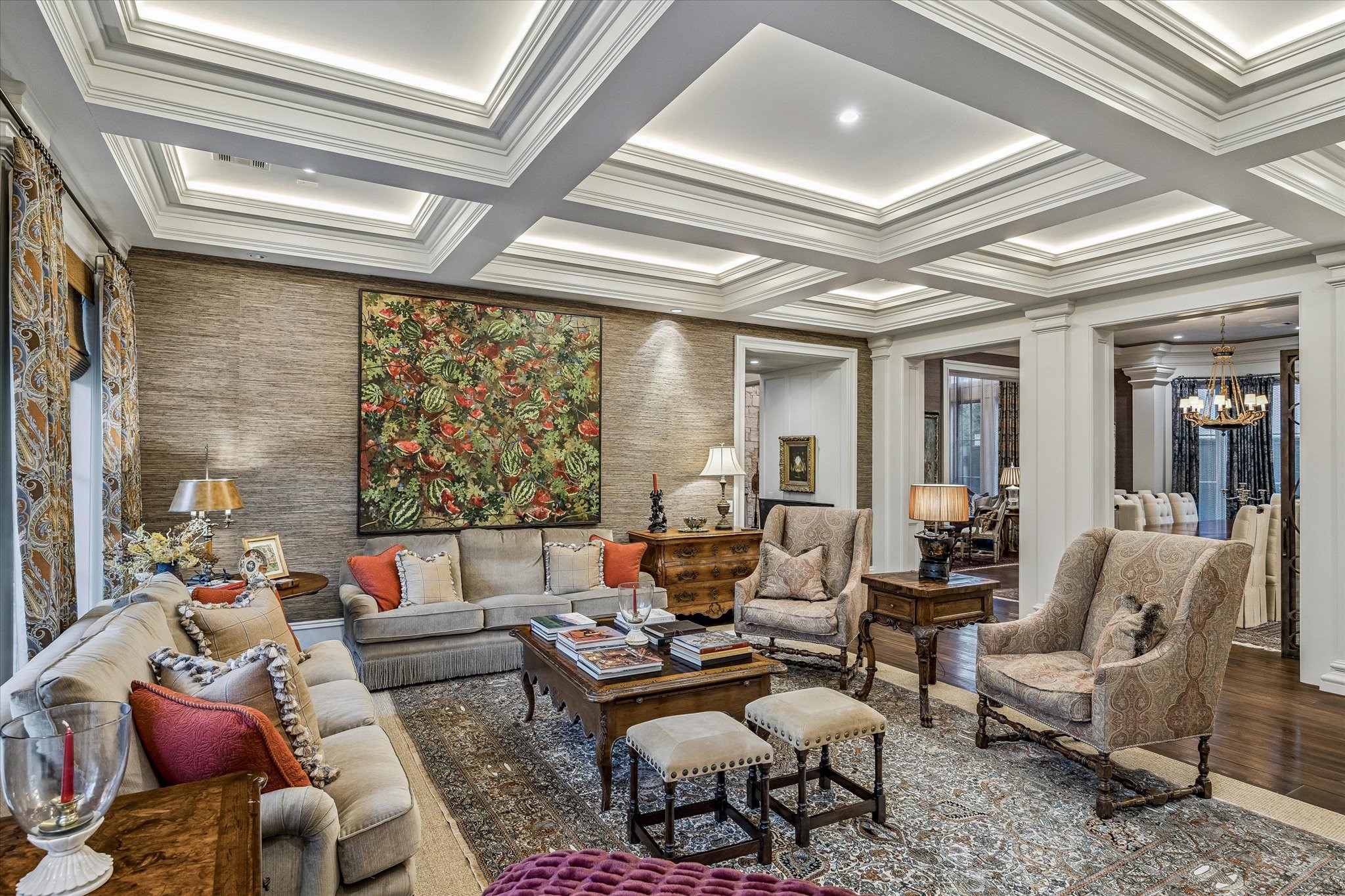 2158 Chilton Road Houston, TX 77019 - Photo 12 of 50 A beautifully appointed gathering space with rich textures, custom ceiling detail, and a striking fireplace focal point. The open-concept layout enhances everyday living while maintaining a refined aesthetic.