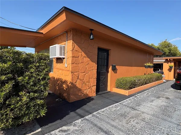 a kitchen with a sink cabinets and appliances