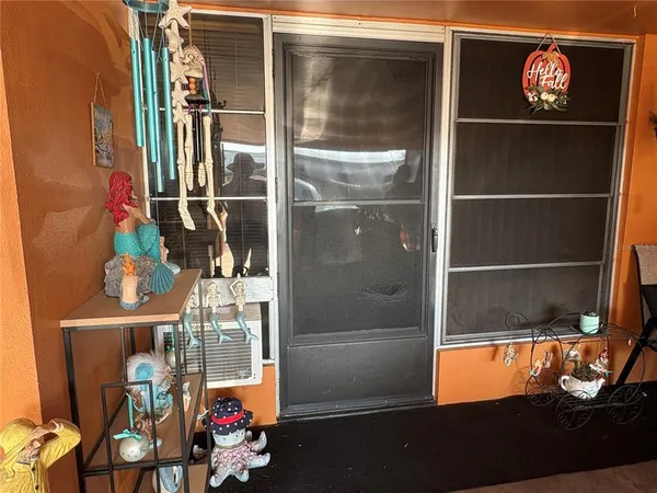 a view of a hallway with washer and dryer