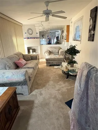 a kitchen with a sink appliances and cabinets